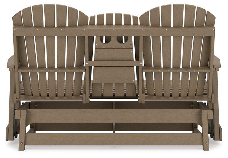 Ashley Furniture Hyland Wave outdoor glider loveseat with cushioned seating and wooden frame, perfect for outdoor relaxation.