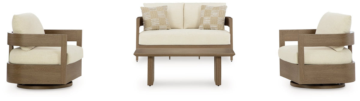Outdoor seating set by Ashley Furniture featuring cushioned chairs and a matching table in a serene bay setting.