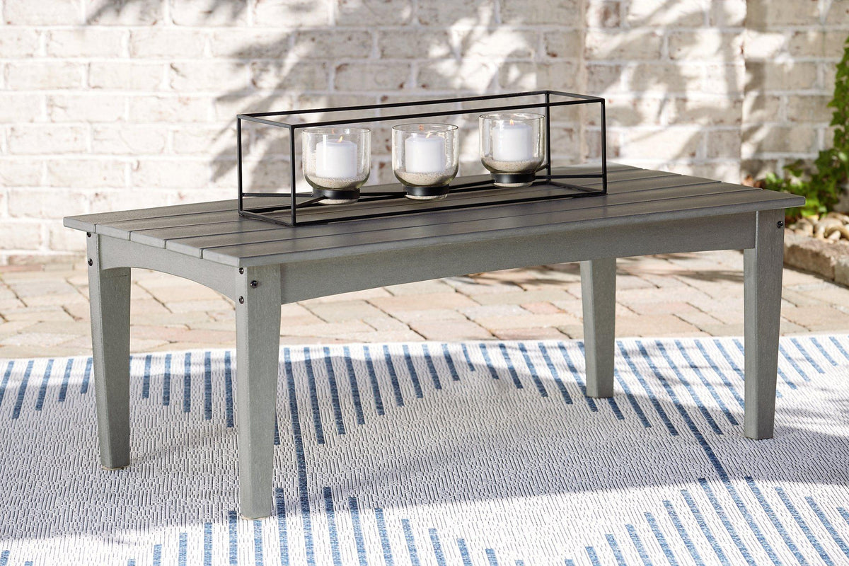 Ashley Furniture Visola outdoor sofa and loveseat with coffee table, featuring weather-resistant cushions and modern metal frames.