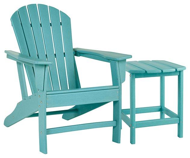 Outdoor table set from Ashley Furniture's Sundown Treasure collection with a glass-top table and cushioned chairs.