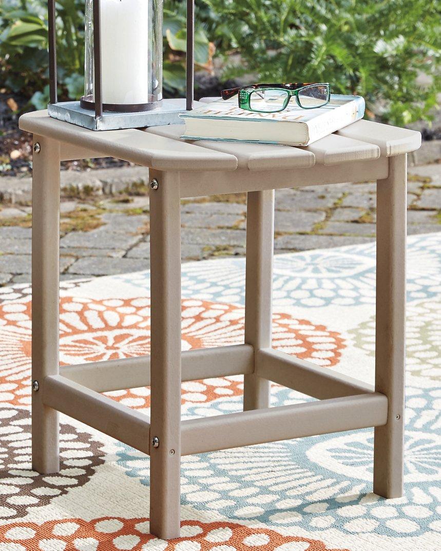 Outdoor table set by Ashley Furniture featuring a glass-top table and cushioned chairs from the Sundown Treasure collection.