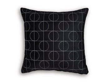 Set of four Ashley Furniture Kydner pillows featuring soft fabric covers and decorative patterns for cozy home decor.