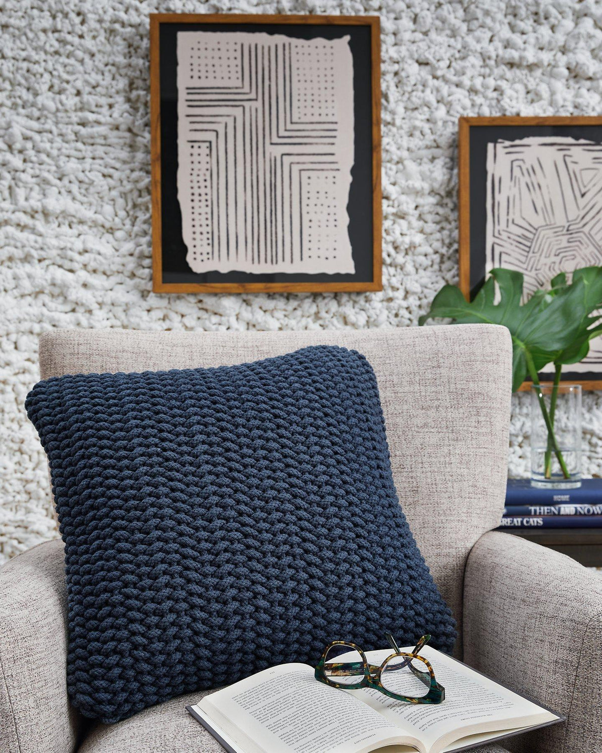 Set of four Ashley Furniture Renemore pillows with soft fabric covers, ideal for bedroom or living room decor.