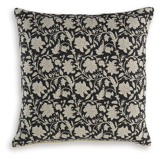 Set of four Ashley Furniture Alanderson pillows with patterned fabric and plush filling, arranged on a modern sofa.