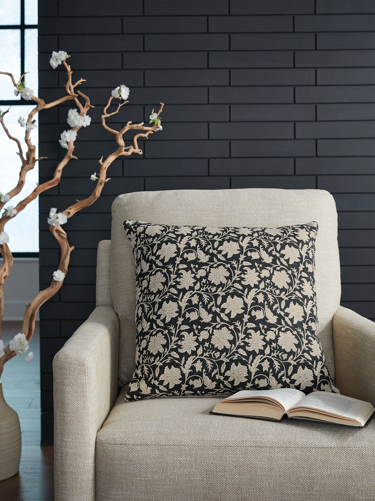 Set of four Ashley Furniture Alanderson pillows with decorative covers, featuring textured and patterned fabric for stylish home decor.