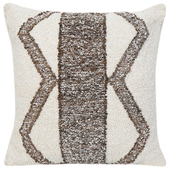 Set of four Ashley Furniture Brettwood pillows with neutral fabric covers, arranged on a bed for a cozy, decorative look.