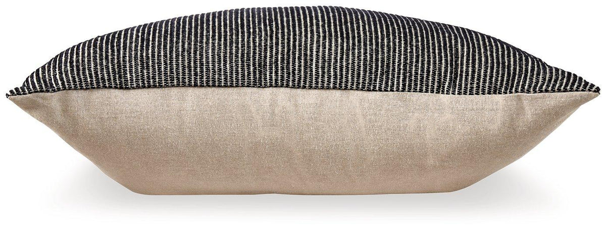 Set of four Ashley Furniture Edelmont pillows with soft fabric covers and decorative patterns for bedroom or living room decor.