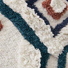 Ashley Furniture Evermore Pillow with soft fabric and decorative stitching, perfect for adding comfort and style to your living space.