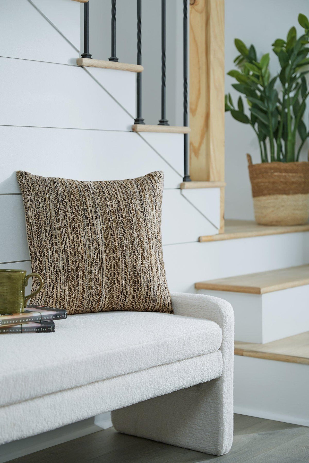 Set of four Ashley Furniture Jayner Pillows featuring soft fabric and stylish design for cozy home decor.