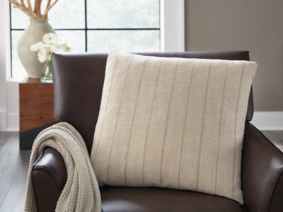 Set of four Ashley Furniture Valwick pillows with soft fabric covers and decorative designs for cozy home decor.