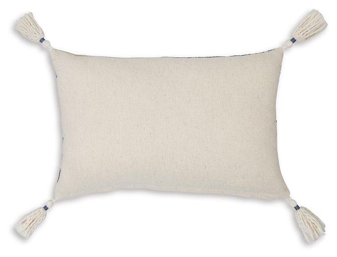 Set of four Ashley Furniture Winbury pillows featuring soft, neutral fabric and decorative accents for cozy bedroom decor.