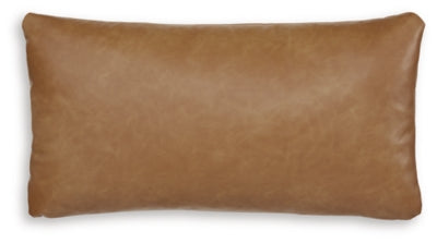 Set of four Ashley Furniture Danvale pillows with soft fabric covers, arranged on a bed for cozy comfort and stylish decor.