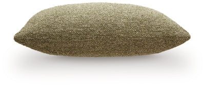 Set of four Ashley Furniture Macsen pillows with soft fabric covers, displayed on a sofa for stylish home decor.