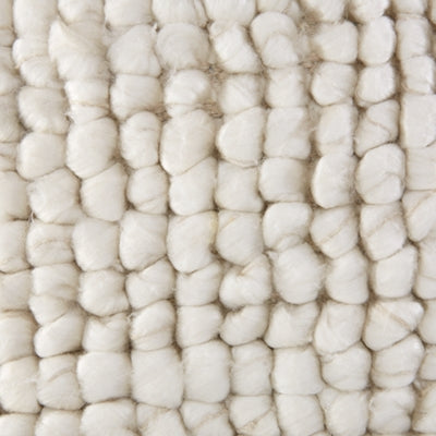 Ashley Furniture Aavie Pillow with textured fabric in a cozy, stylish design perfect for home décor and comfort.