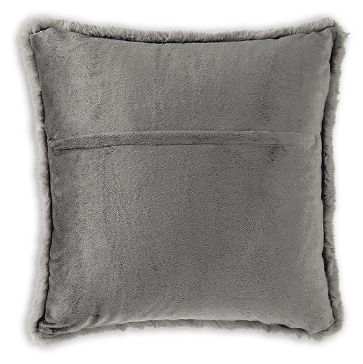 Set of four Ashley Furniture Gariland pillows featuring textured fabric and neutral tones, perfect for sofa or bed decor.