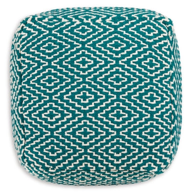 Ashley Furniture Brynnsen pouf with soft fabric and tufted top, perfect for living room or bedroom decor.