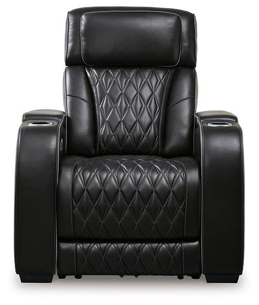 Ashley Furniture Boyington Power Recliner with padded armrests and plush upholstery, designed for comfortable lounging.