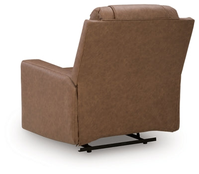 Ashley Furniture Mackmenville recliner with plush fabric and padded armrests, shown from the back in a stylish living room setting.