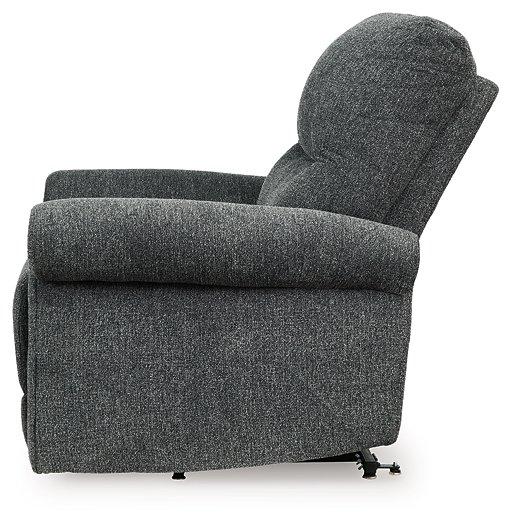 Ashley Furniture Aureta Power Lift Recliner in plush fabric, showing the reclined position with armrests and footrest extended.