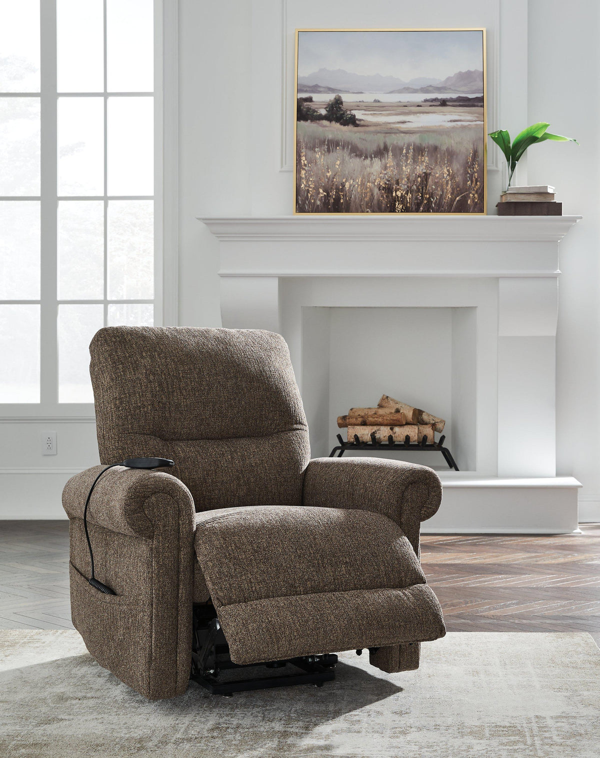 Ashley Furniture Aureta Power Lift Recliner in plush fabric with padded armrests and a supportive backrest.