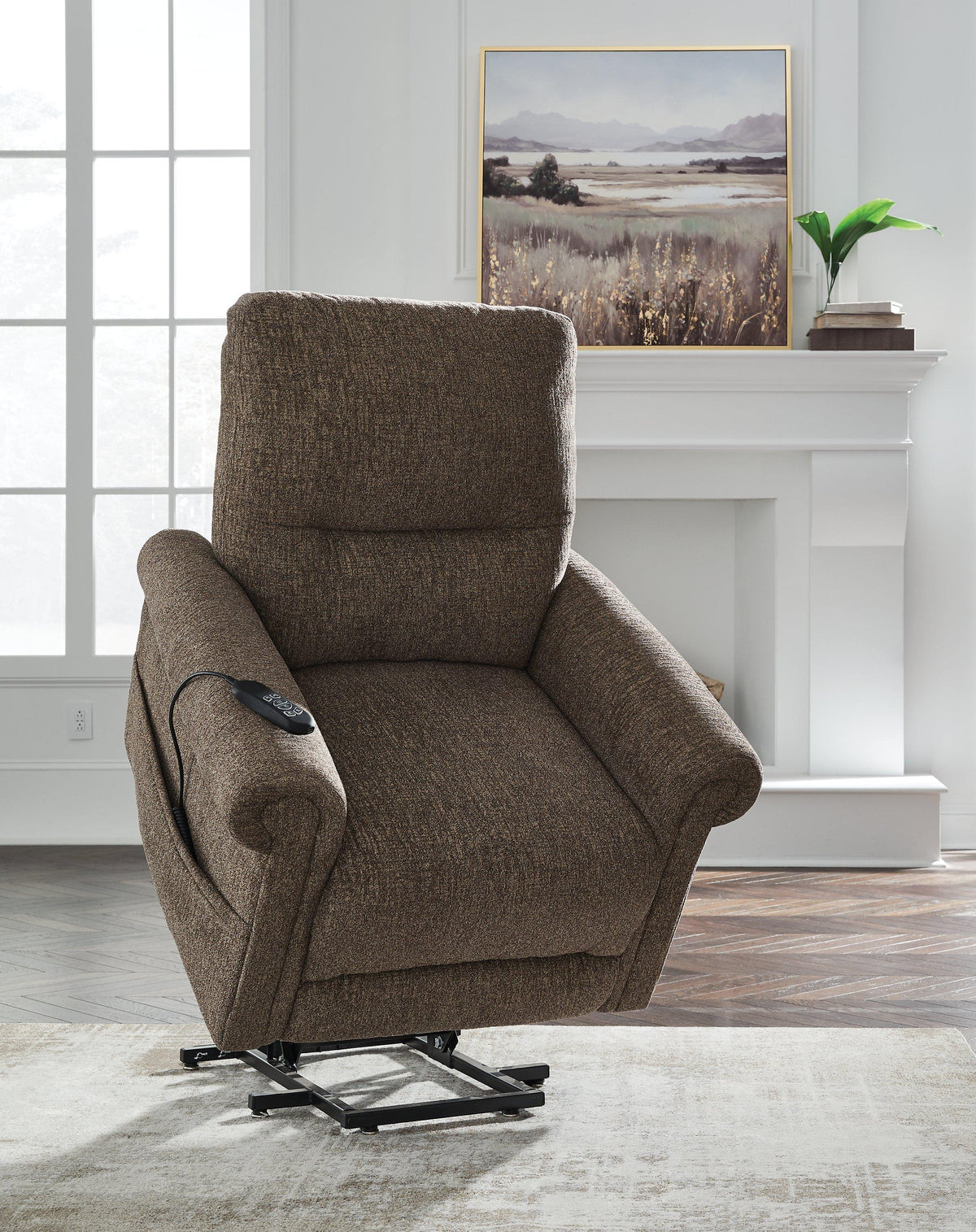 Ashley Furniture Aureta Power Lift Recliner in beige fabric with plush cushioning and a supportive backrest.