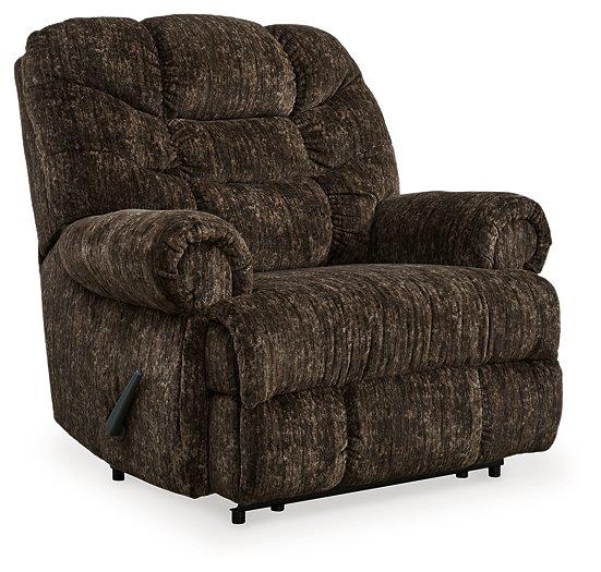 Comfortable Ashley Furniture Movie Man recliner with padded armrests and plush upholstery, perfect for relaxing.