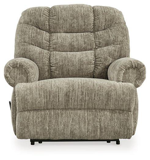 Ashley Furniture Movie Man Recliner showing plush brown upholstery and padded armrests, perfect for comfortable home theater seating.