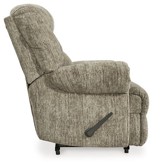 Comfortable Ashley Furniture Movie Man recliner with plush cushioning and wide armrests, designed for relaxed viewing.
