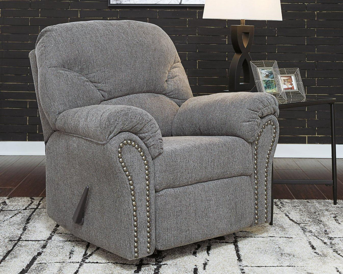 Ashley Furniture Allmaxx Recliner in beige fabric with padded armrests and a plush backrest, showcasing a comfortable living room chair.