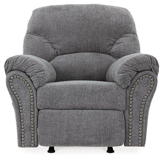 Comfortable Ashley Furniture Allmaxx recliner with plush cushions and dark upholstery, perfect for relaxing in any living room.