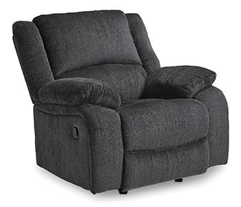Ashley Furniture Draycoll recliner showing plush fabric upholstery and padded armrests in a cozy living room setting.
