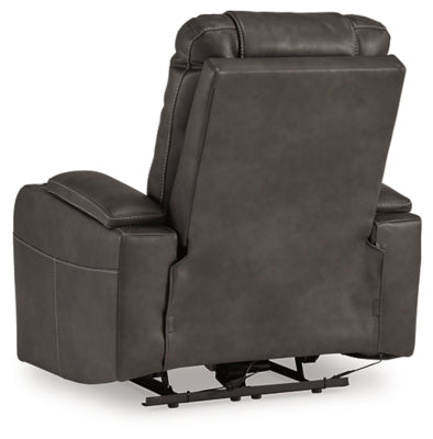 Ashley Furniture Feazada power recliner with plush upholstery and padded armrests, shown from the back in this image.