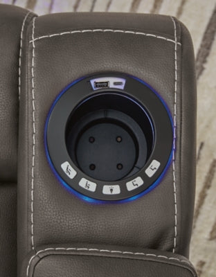 Ashley Furniture Feazada power recliner with USB port, featuring plush upholstery and detailed stitching for added comfort and style.