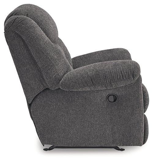 Ashley Furniture Foreside recliner showing a plush, comfortable upholstered armchair with a classic design and neutral fabric.
