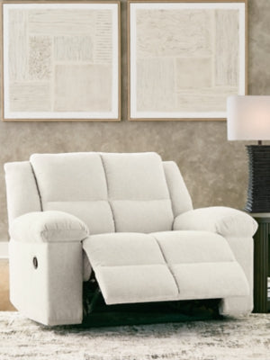 Ashley Furniture Orlen oversized recliner in open position, plush fabric with wide armrests and comfortable cushioning.