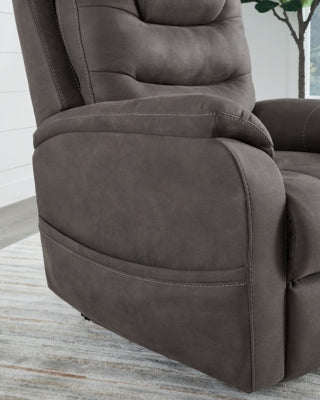 Ashley Furniture Snowfield Power Lift Recliner with plush upholstery and pocket details, designed for comfortable, effortless reclining.