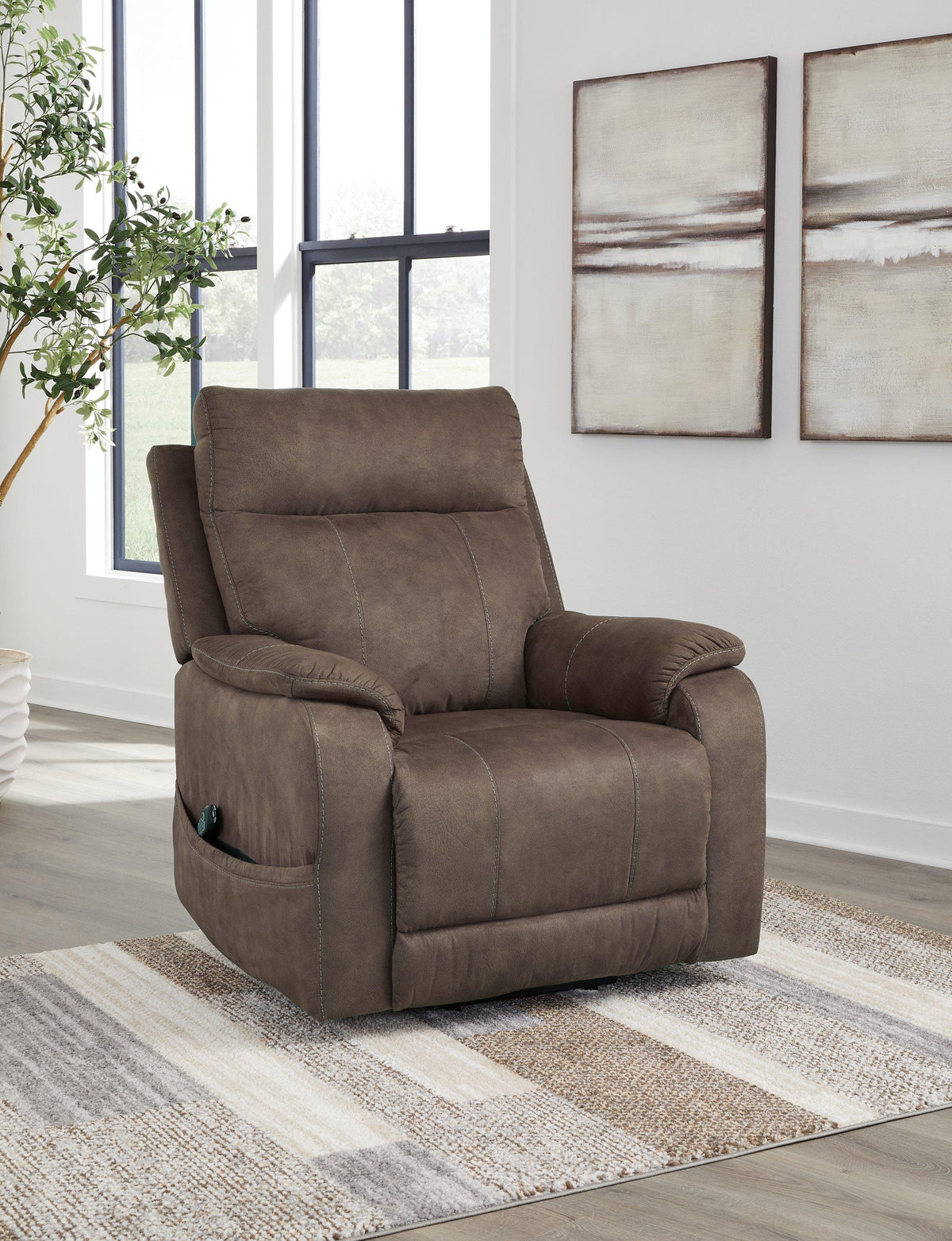Ashley Furniture Crestmeade Power Lift Recliner with plush upholstery and padded armrests, designed for comfort and easy reclining.