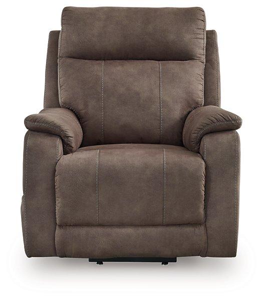 Ashley Furniture Crestmeade Power Lift Recliner in plush fabric with a padded backrest and armrests, designed for comfort and support.
