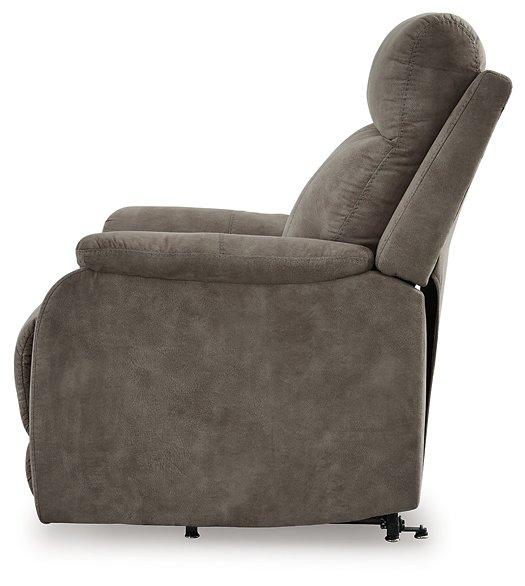 Ashley Furniture Crestmeade power lift recliner with plush upholstery and padded armrests, designed for comfort and support.
