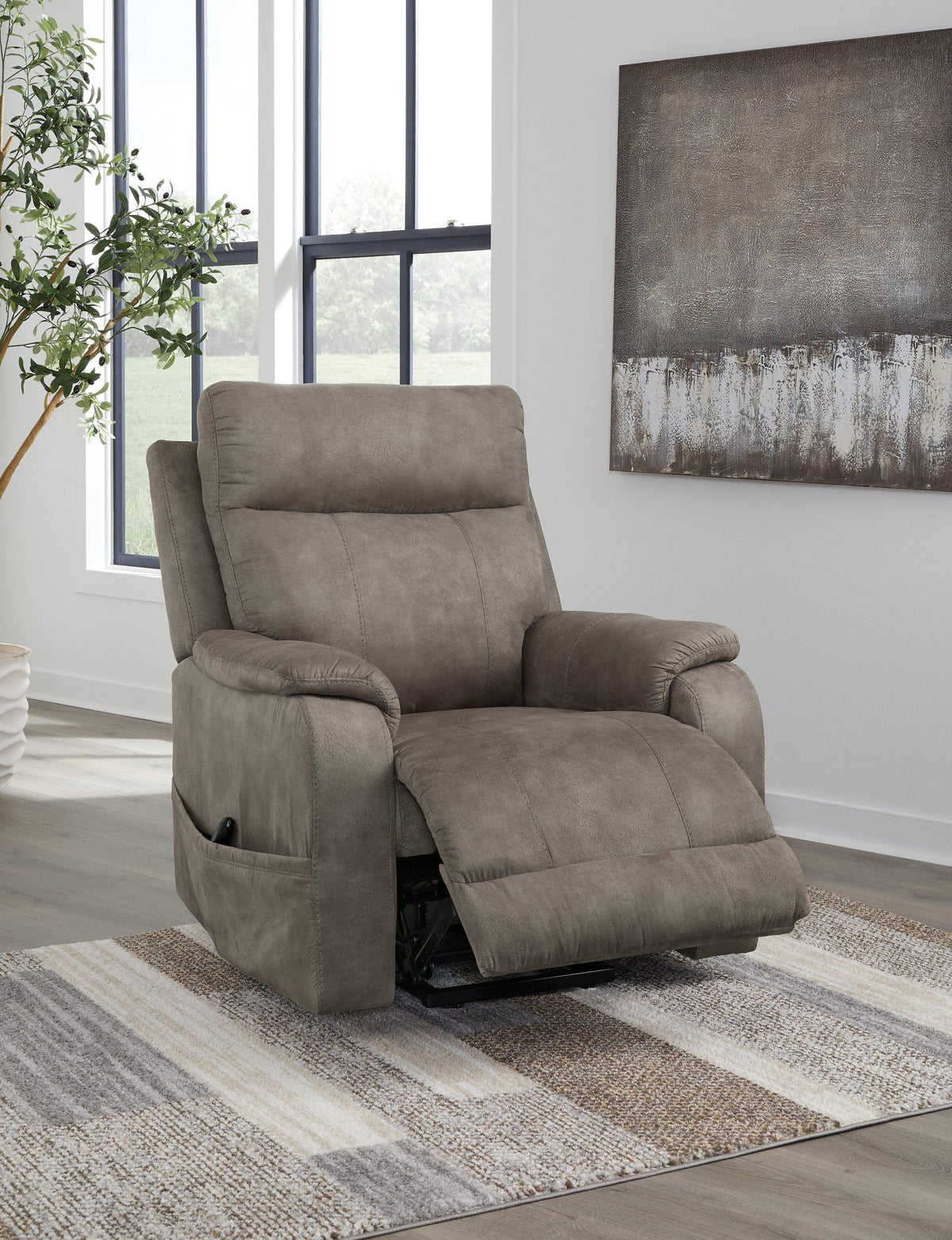 Ashley Furniture Crestmeade Power Lift Recliner with plush upholstery and adjustable reclining features.