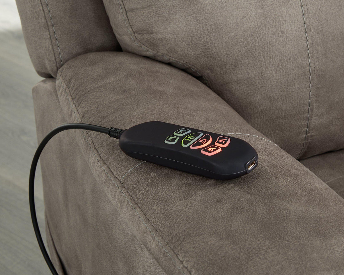 Ashley Furniture Crestmeade Power Lift Recliner with plush upholstery and adjustable backrest for comfort and support.