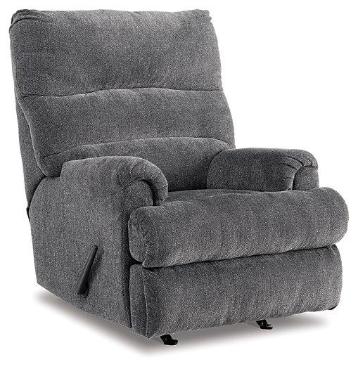 Ashley Furniture Man Fort Recliner showing plush fabric upholstery and ergonomic design in a cozy living room setting.