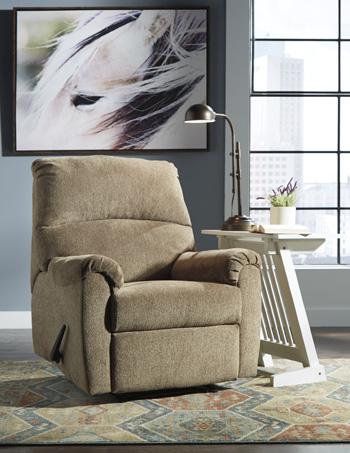 Nerviano recliner chair by Ashley Furniture with plush cushioning and wooden legs, shown in a cozy living room setting.