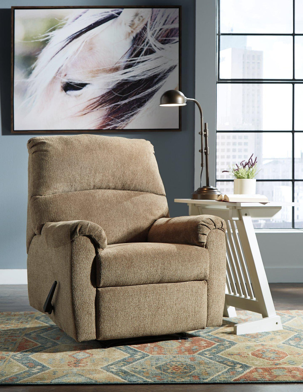 Ashley Furniture Nerviano recliner with padded armrests and plush fabric, showcasing a comfortable, stylish recliner design.