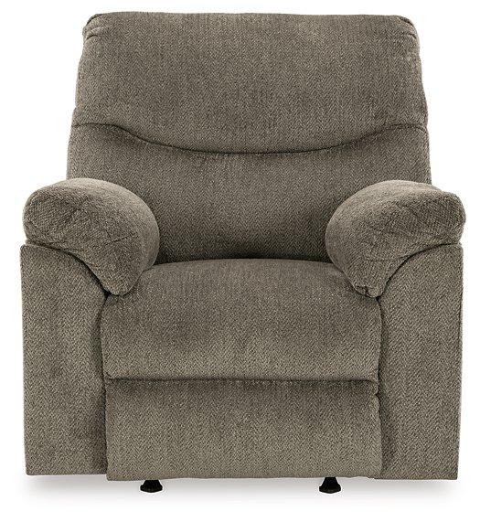 Comfortable Ashley Alphons Recliner with plush fabric upholstery and padded armrests, perfect for relaxation.