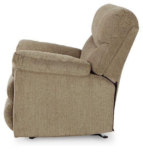 Comfortable Alphons recliner by Ashley Furniture with plush upholstery and padded armrests, ideal for relaxing in living rooms.