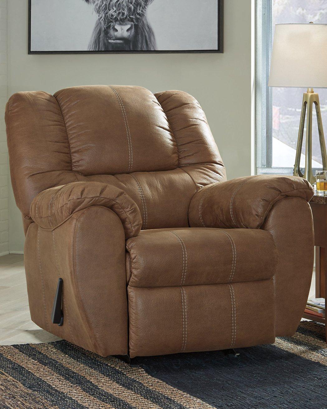 Comfortable Ashley Furniture McGann Recliner with plush cushioning and armrests, perfect for relaxing living room seating.