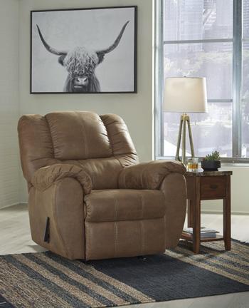 Comfortable Ashley McGann recliner with plush fabric and padded armrests, perfect for relaxing in a modern living room.