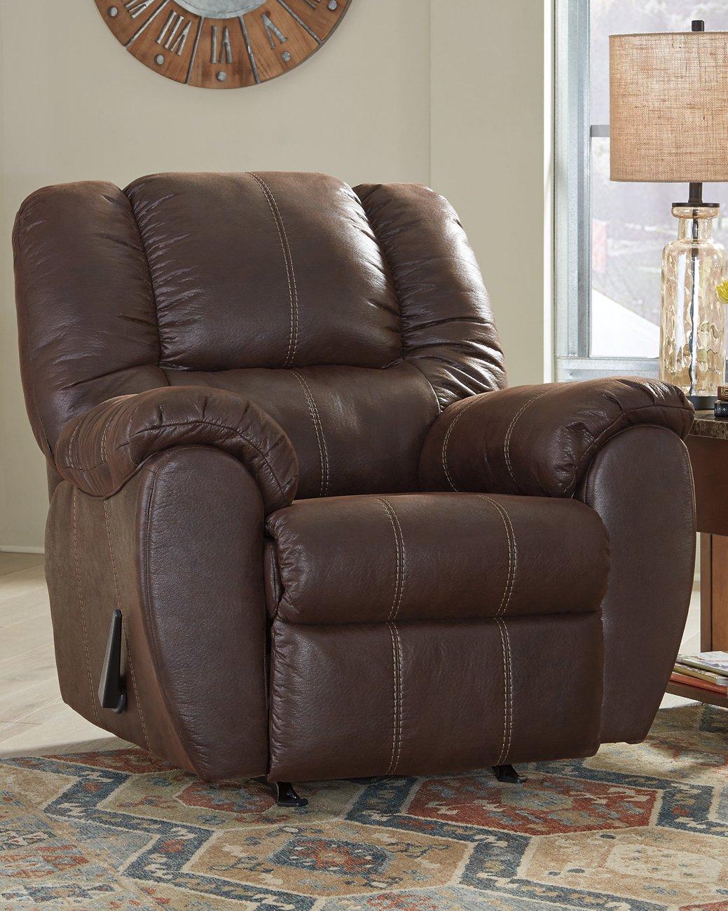 Comfortable Ashley McGann Recliner with plush cushioning and classic design, perfect for a cozy living room seat.