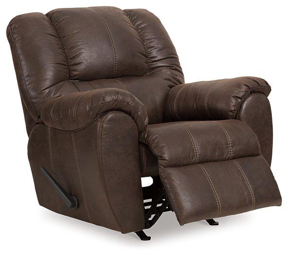Comfortable Ashley McGann Recliner in neutral fabric, featuring plush cushioning and a classic design for living room relaxation.